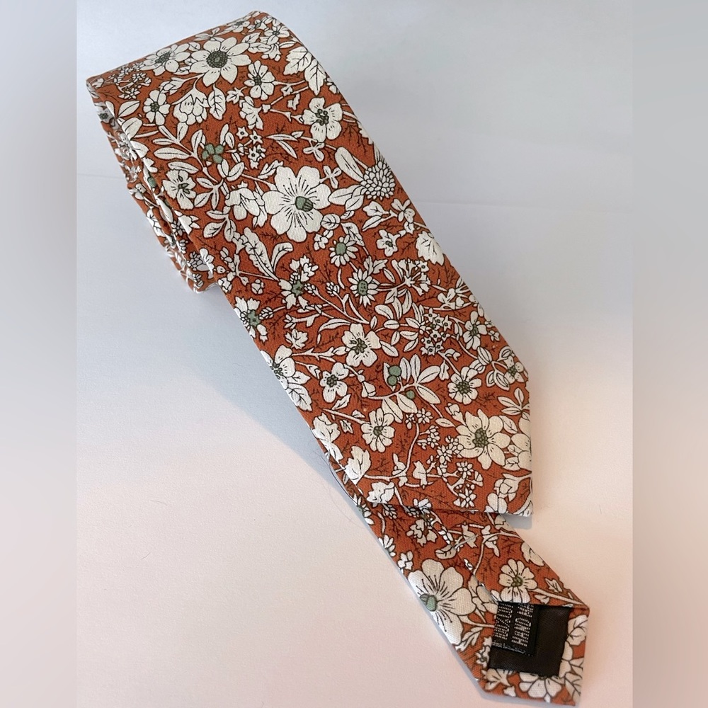 Men’s Slim Neck Tie. Burnt Orange with White Flowers. Great with poplin suits